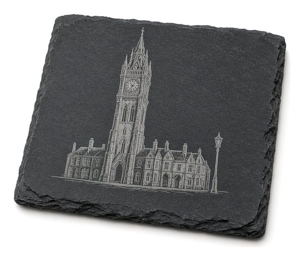 Sample design: fictitious Victorian Gothic clock tower beside a street lamp, etched on a square natural slate coaster.