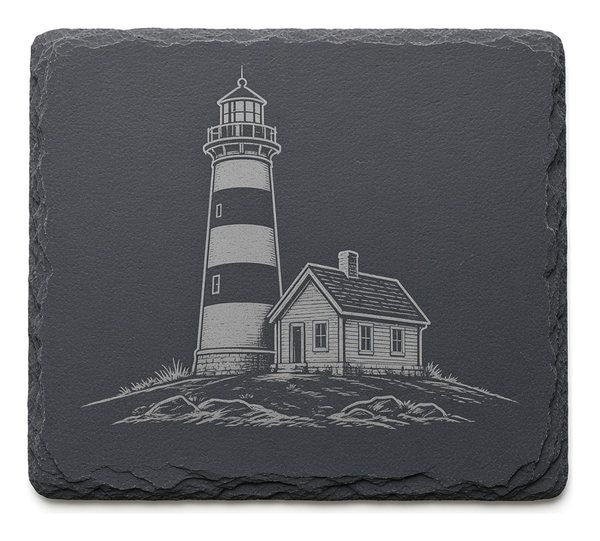 Sample design: fictitious striped lighthouse beside a keeper's cottage, etched on a square natural slate coaster.
